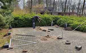 Start bouw overkapping auto